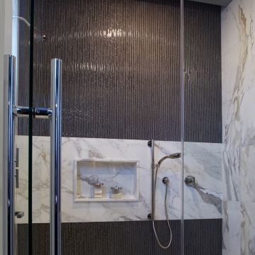 Kinetic Khaki Random Interlocking beautiful dark gray premium tile on bathroom shower wall, 12x12