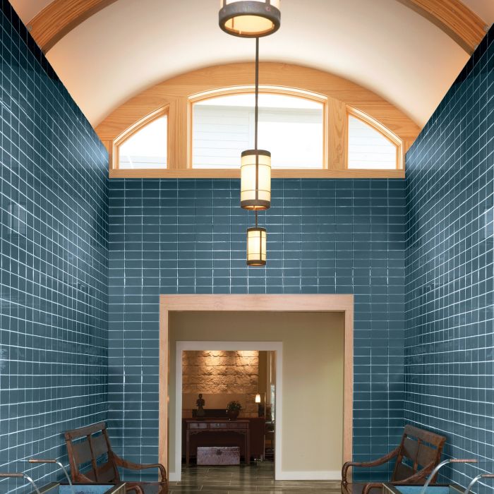 Twilight Blue Glass-Look Porcelain Wall Tile. 12x12 Straight Joint wall cladding design.