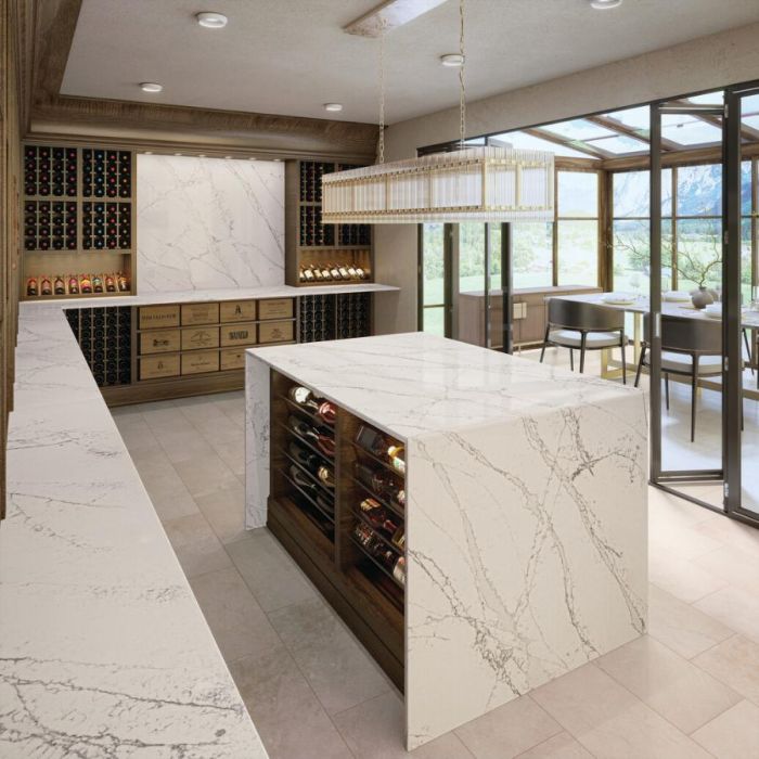 Spacious kitchen floor gleams with modern elegance, featuring 12x24 Mentor Rectangle Stone-look Grey porcelain tiles.