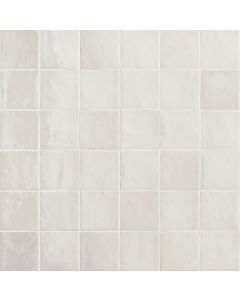 Close-up of textured white ceramic tile with handmade look, perfect for bathrooms and kitchens