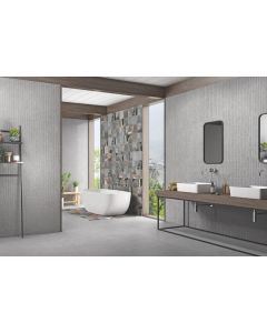 CEMENTI IMPATTO refined gray premium tile on bathroom shower wall, 24x47