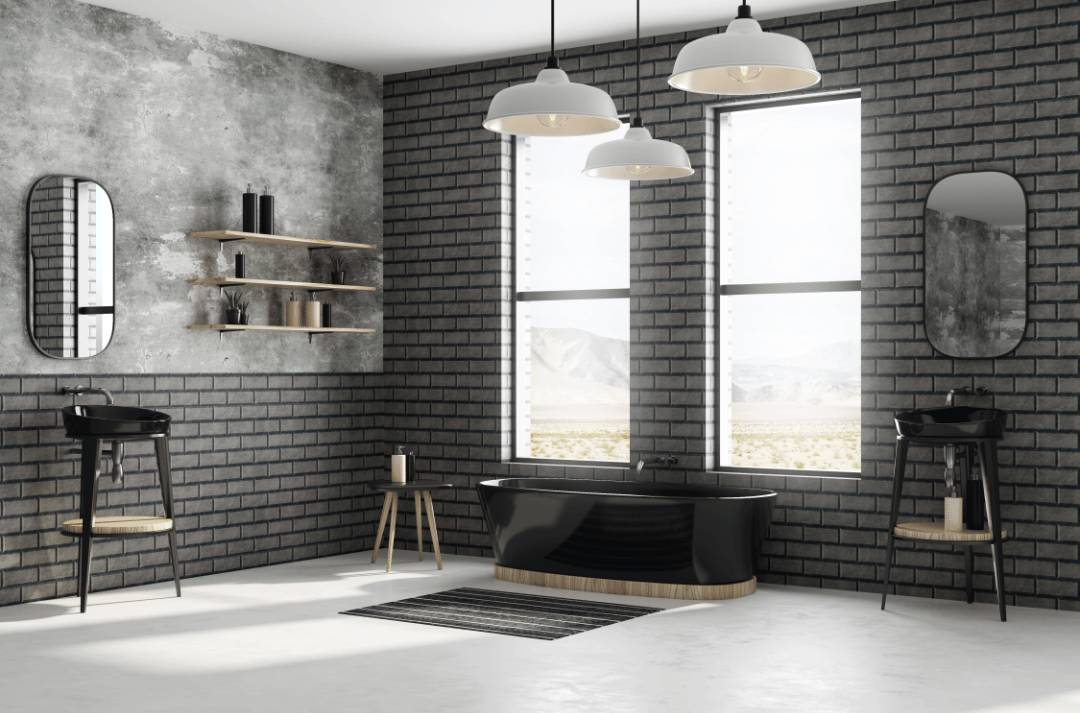 An industrial-inspired bathroom with charcoal-colored or smoked rectangle brick tile patterns.