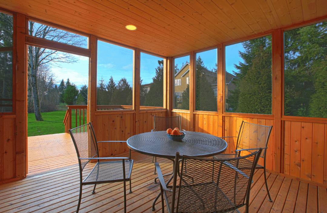 Screened porch with wood deck flooring