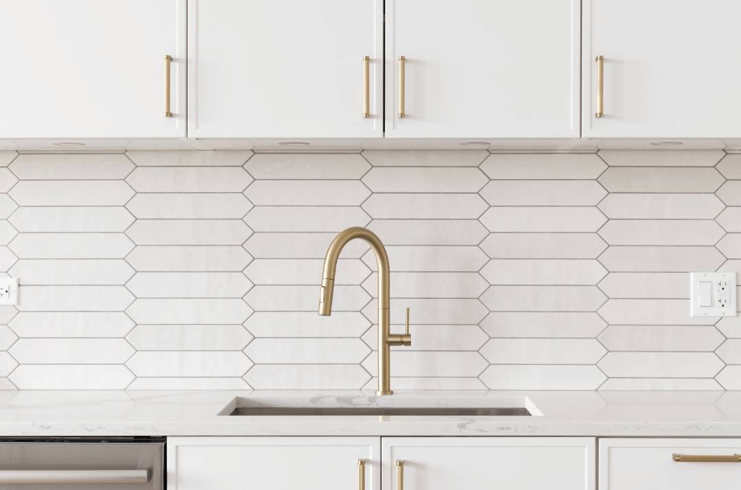 A minimalist kitchen backsplash with white picket subway tiles and black grout
