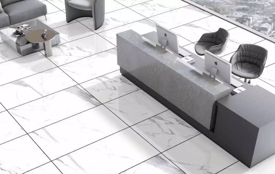 White subway tiles with black grout on an office floor