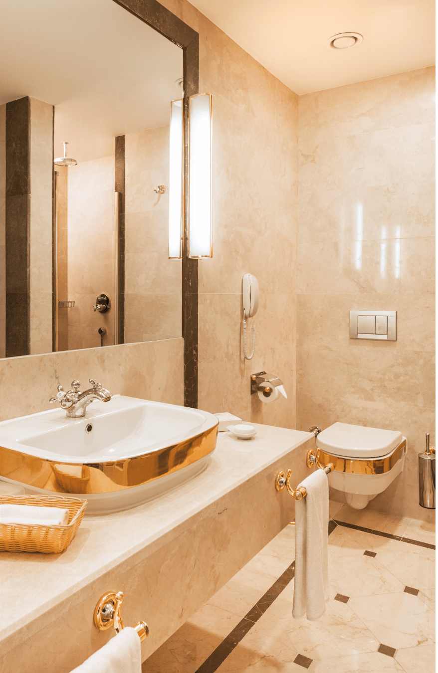 Travertine tiles bathroom tiles blending with metallic fixtures